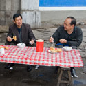 Locals eating, Muslim Quarter, Lanzhou, Gansu Province, China.