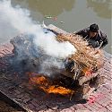 Cremation on the Bagmati River, Pashupatinath, Kathmandu Valley, Nepal.