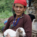 Nepalese woman and goat, Village by the Bhote Kosi River, Nepal.