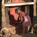 Child at altar, Bhaktapur, Kathmandu Valley, Nepal.